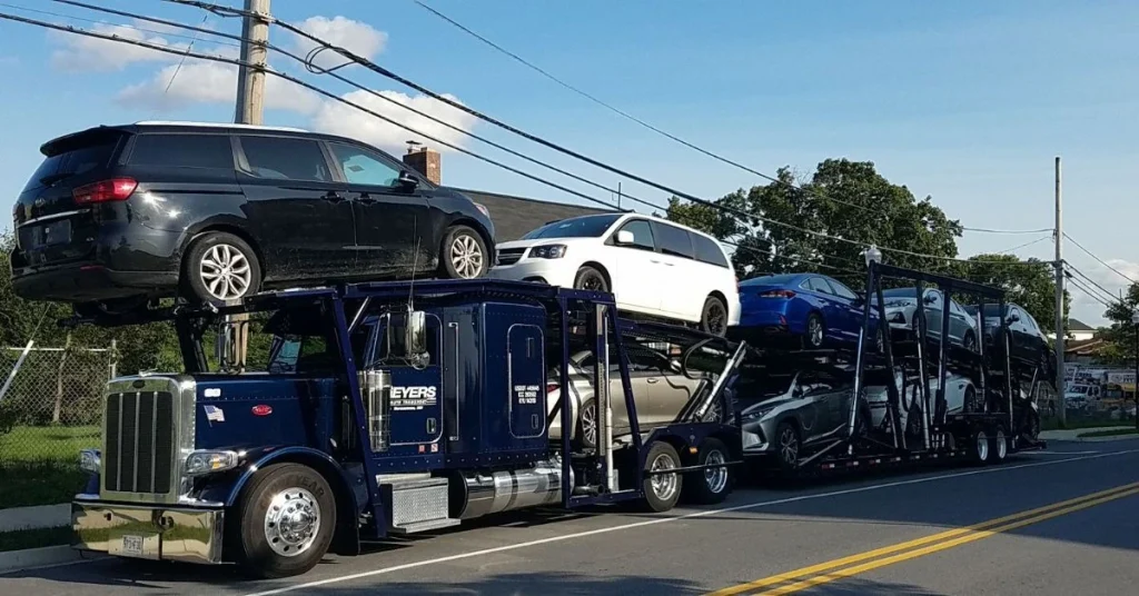 How to Achieve Low Cost Car Shipping - Save Big Today 4 Car-Transport-Truck-Hauling-Multiple-Vehicles-on-the-Road